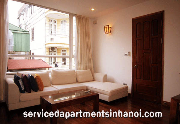Bright one bedroom apartment rental in Truc Bach area, wooden floor