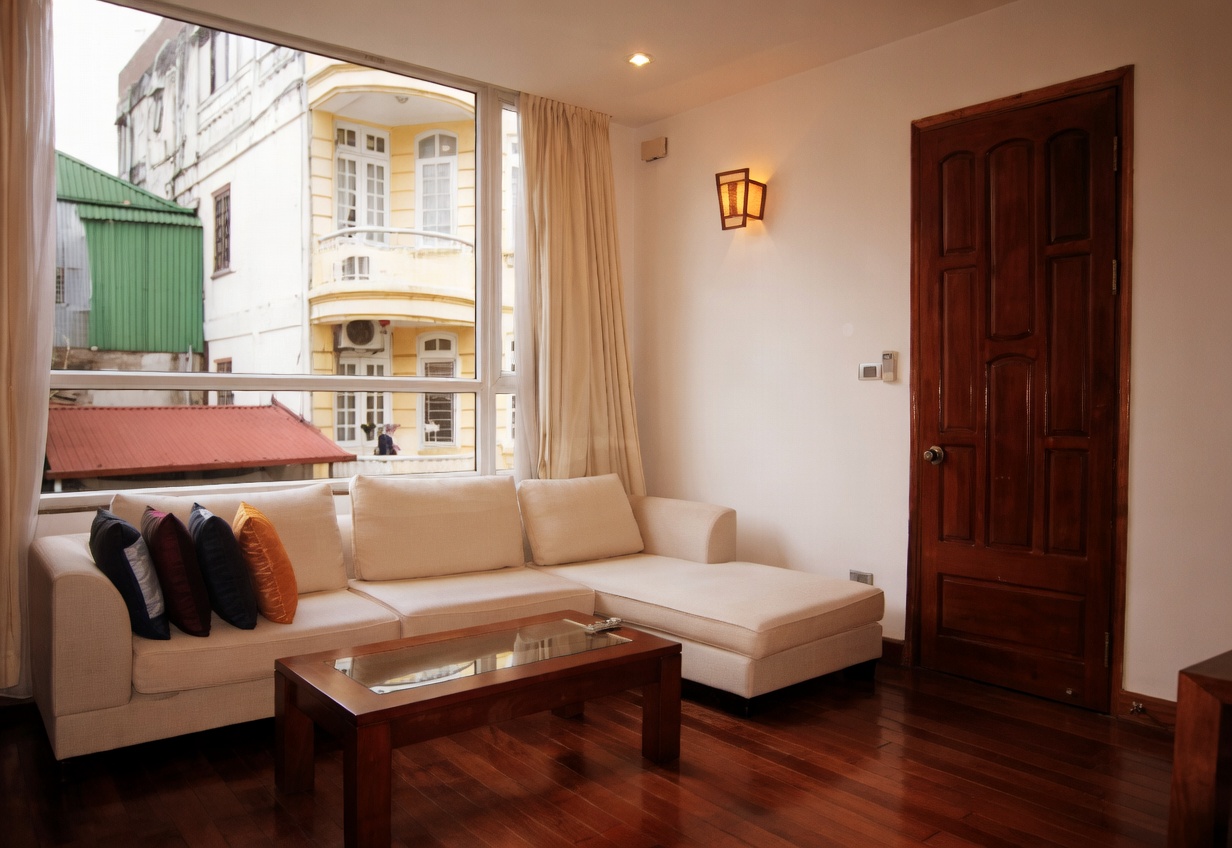 Bright one bedroom apartment rental in Truc Bach area, wooden floor