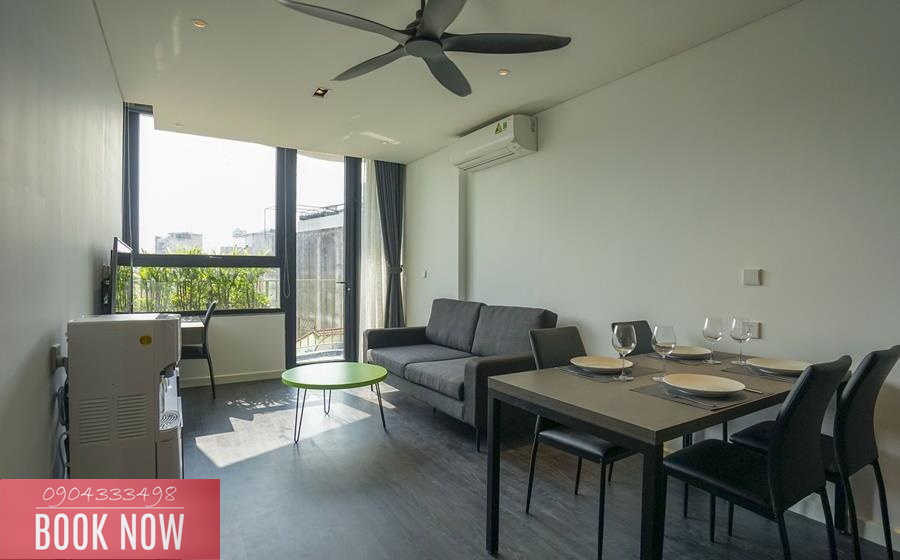 Open-air 1-bedroom serviced apartment with many glass doors welcomes natural light